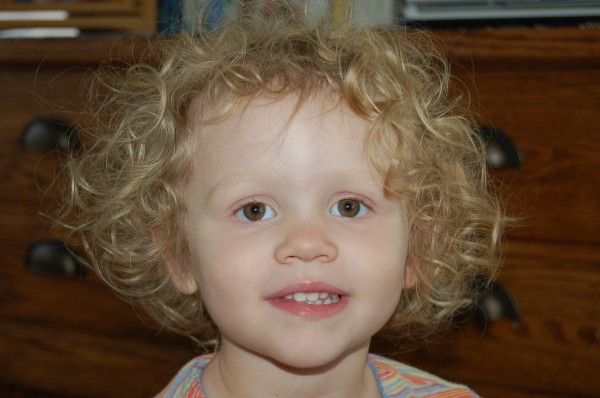 DSC_0340 Eden on Saturday. On Sunday, she had pig-tails which were still very curly!