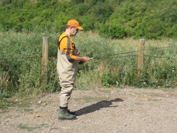 denver dig trip 006 We practiced fly fishing technique on dry ground first. Lots of thinking at first, but it does get intuitive.