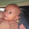 This picture was taken the evening before, during Harper's bath in the kitchen sink at Reuben and Heidi's house. His trust is amazing!